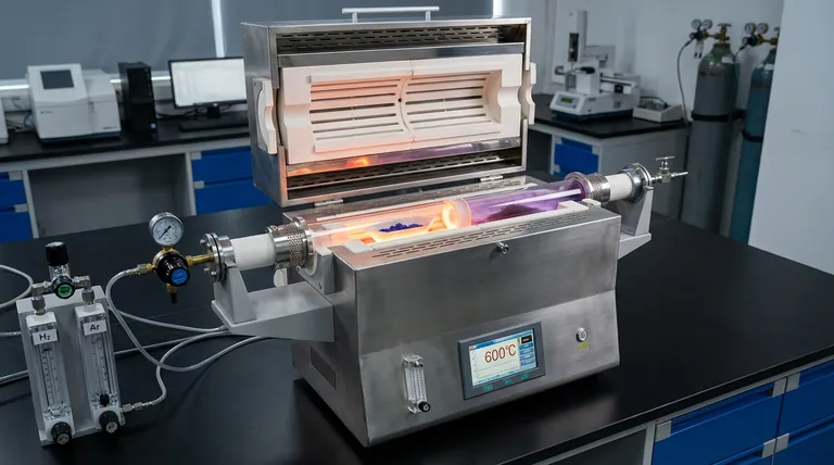 What is the technical significance of using a dual-temperature zone tube furnace for CoTe2 tellurization?