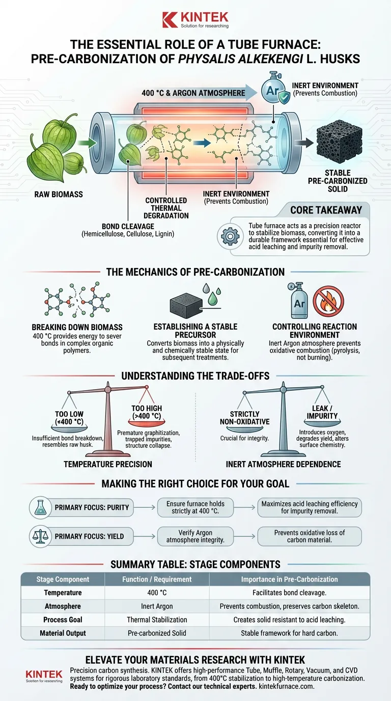 What is the primary role of a tube furnace during pre-carbonization? Optimize Biomass-to-Hard-Carbon Conversion Visual Guide