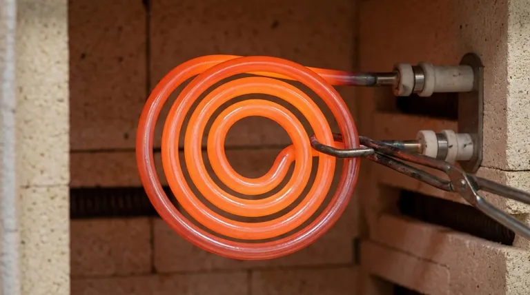 MoSi2 소자가 고온에서 산화를 견딜 수 있도록 돕는 보호 메커니즘은 무엇인가요? 자가 치유 실리카 층에 대해 알아보세요